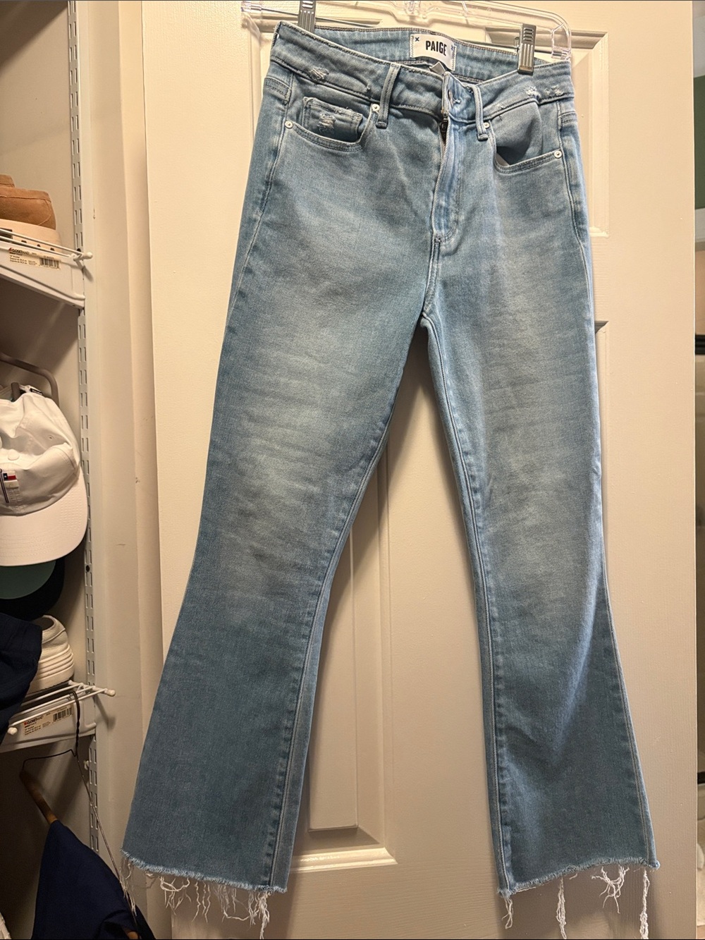 PAIGE Light Wash Flare Jeans with Raw Hem